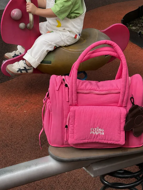 Raspberry Jam bag at a playground