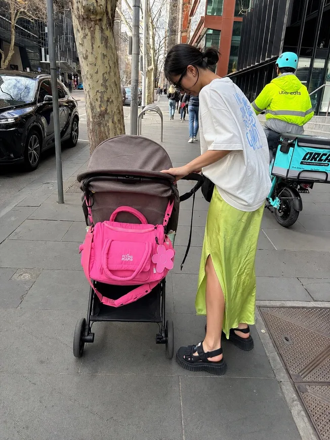 Raspberry Jam bag on a stroller in the city